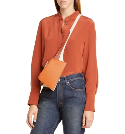 Shop The Volon Dia Asymmetrical Convertible Leather Belt Bag - Orange In Pumpkin