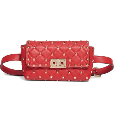 Shop Valentino Rockstud Leather Belt Bag In Rouge Pur