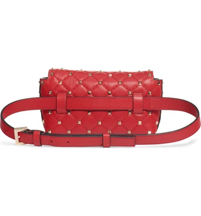 Shop Valentino Rockstud Leather Belt Bag In Rouge Pur