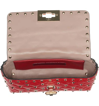 Shop Valentino Rockstud Leather Belt Bag In Rouge Pur