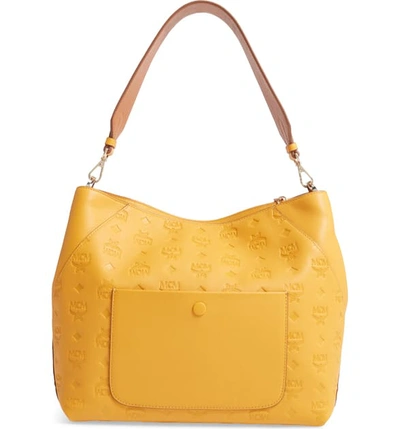 Shop Mcm Medium Klara Monogram Leather Hobo - Yellow In Golden Mango