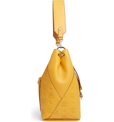 Shop Mcm Medium Klara Monogram Leather Hobo - Yellow In Golden Mango