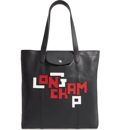 Shop Longchamp Large Le Pliage Logo Leather Tote In Black