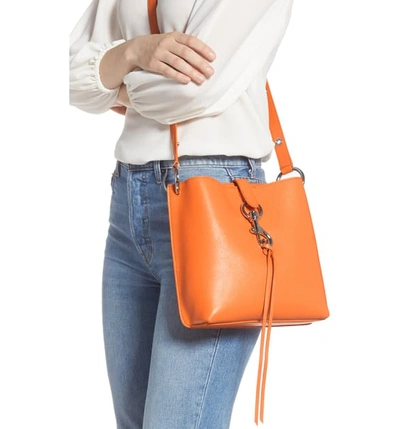 Shop Rebecca Minkoff Small Megan Leather Crossbody Feed Bag - Orange In Monarch