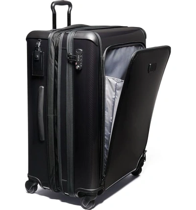 Shop Tumi Tegra-lite Medium Trip 29-inch Expandable Four Wheel Suitcase In Black/ Black