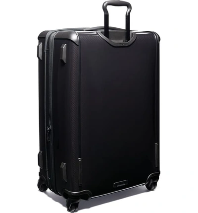 Shop Tumi Tegra-lite Medium Trip 29-inch Expandable Four Wheel Suitcase In Black/ Black