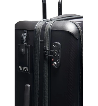 Shop Tumi Tegra-lite Medium Trip 29-inch Expandable Four Wheel Suitcase In Black/ Black