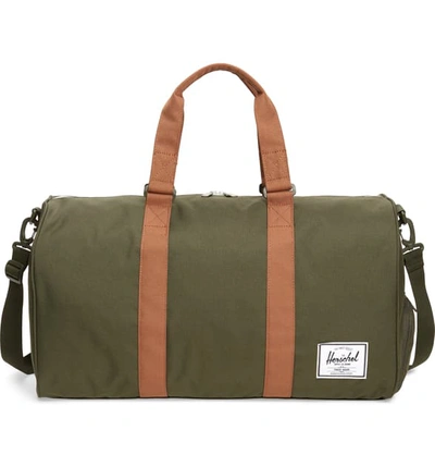 Shop Herschel Supply Co Duffle Bag - Green In Dark Olive/ Saddle Brown