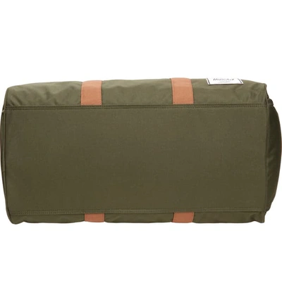 Shop Herschel Supply Co Duffle Bag - Green In Dark Olive/ Saddle Brown