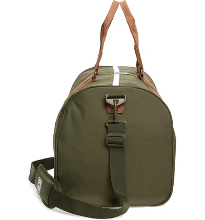 Shop Herschel Supply Co Duffle Bag - Green In Dark Olive/ Saddle Brown