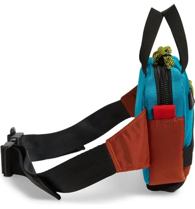 Shop Topo Designs Mini Quick Pack Belt Bag - Orange In Clay/ Turquoise