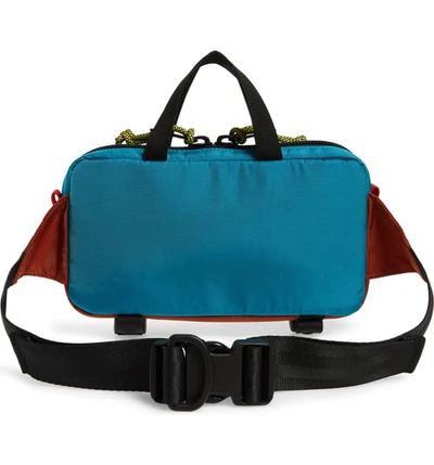 Shop Topo Designs Mini Quick Pack Belt Bag - Orange In Clay/ Turquoise