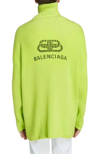 Shop Balenciaga Oversize Turtleneck Sweater In Lime