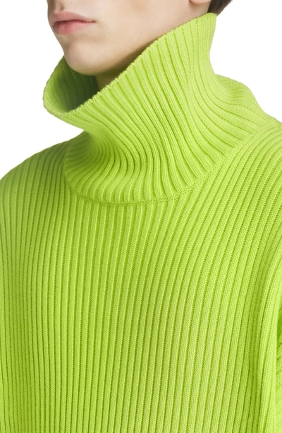 Shop Balenciaga Oversize Turtleneck Sweater In Lime