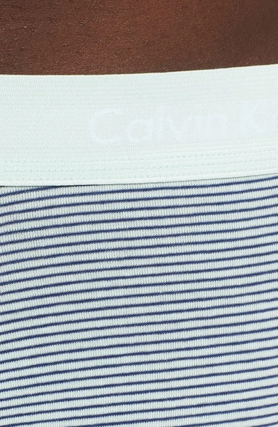 Shop Calvin Klein 3-pack Stretch Cotton Low Rise Trunks In Green/ Stripe/ Blue Depth