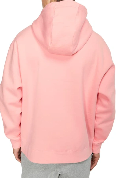 Shop Nike Pullover Hoodie In Bleached Coral