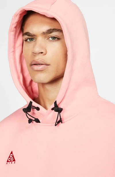 Shop Nike Pullover Hoodie In Bleached Coral