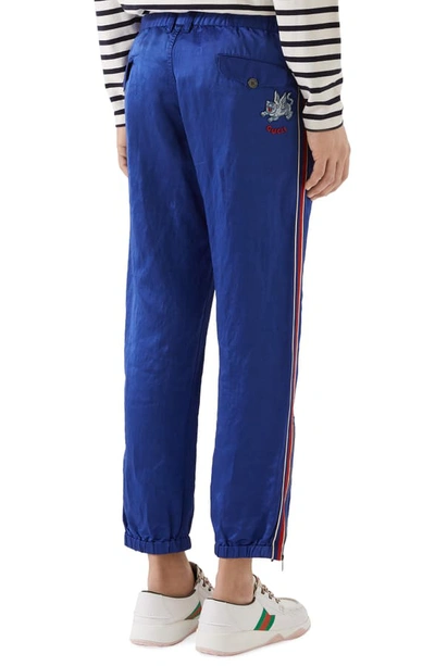 Shop Gucci Flying Tiger Satin Jogging Pants In Electric Blue/ Mc