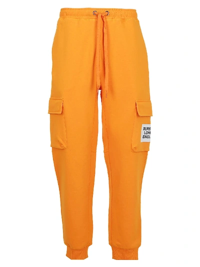 Shop Burberry Logo Print Track Pants In Bright Orange