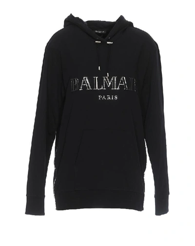 Shop Balmain Logo Embossed Hoodie In Black
