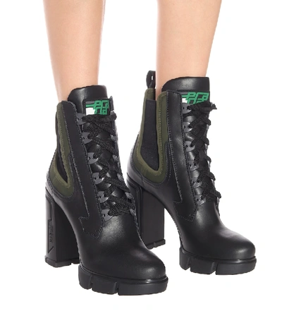 Shop Prada Leather Ankle Boots In Black