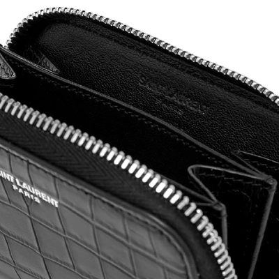 Shop Saint Laurent Crocodile Embossed Leather Zip Coin Purse In Black