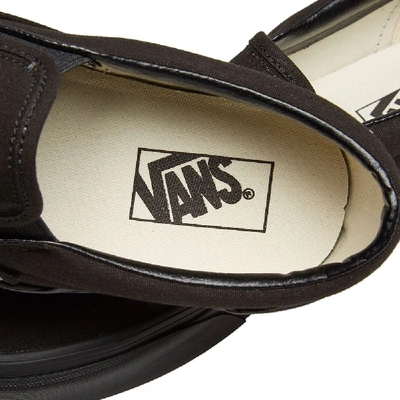 Shop Vans Classic Slip On In Black