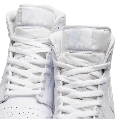 Shop Nike Air Jordan 1 Mid In White