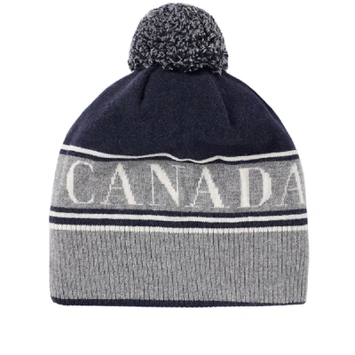 Shop Canada Goose Logo Pom Beanie In Blue