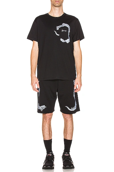 Shop Givenchy Snake Print Bermuda Shorts In Black
