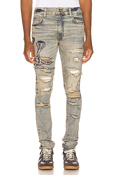 Amiri Mx1 Skinny-fit Appliquéd Faux Snake-panelled Distressed Stretch-denim  Jeans In Dindrtindig | ModeSens