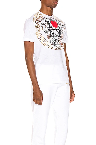 Shop Versace Graphic Tee In White