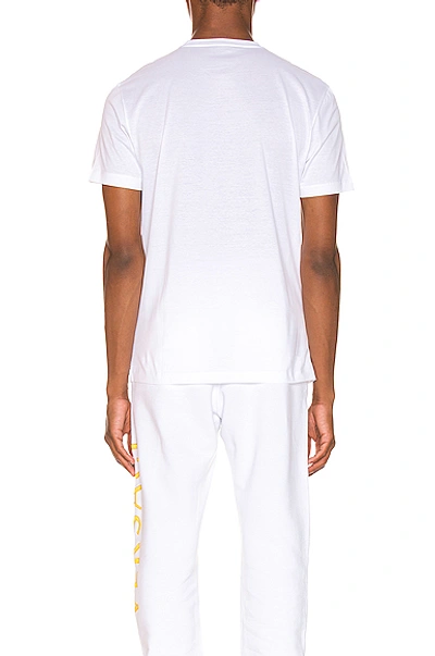 Shop Versace Graphic Tee In White