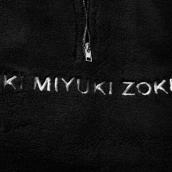 mki sherpa quarter zip black