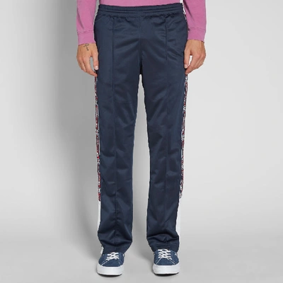 Shop Champion Reverse Weave Popper Taped Track Pant In Blue