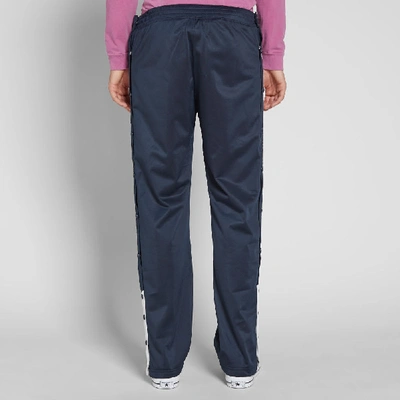 Shop Champion Reverse Weave Popper Taped Track Pant In Blue