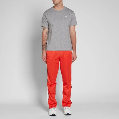 Shop Ami Alexandre Mattiussi Ami Taped Track Pant In Red