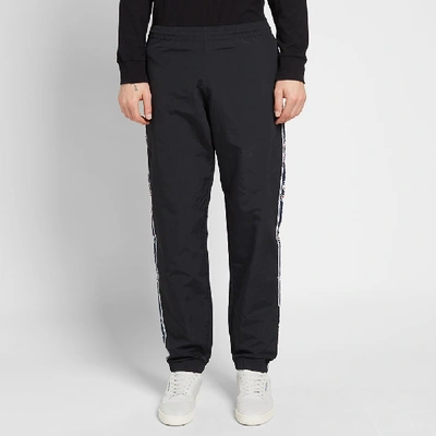 Shop Champion Reverse Weave Vintage Taped Track Pant In Black