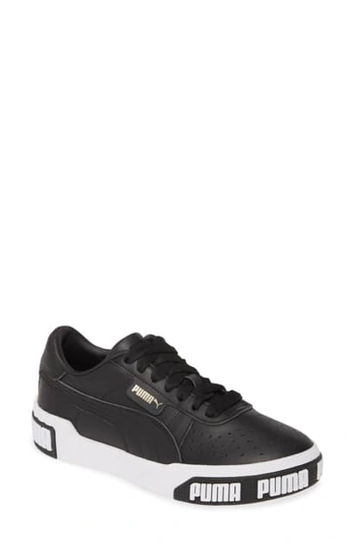 Shop Puma Cali Bold Sneaker In  Black/ Metallic Gold