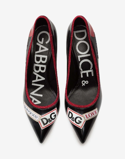 Shop Dolce & Gabbana Polished Calfskin Pumps With Dg Logo Tape Print In Black