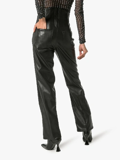 Shop Pushbutton Faux Leather Corset Trousers In Black