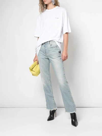 Shop Givenchy Flared Distressed Light Blue Jeans
