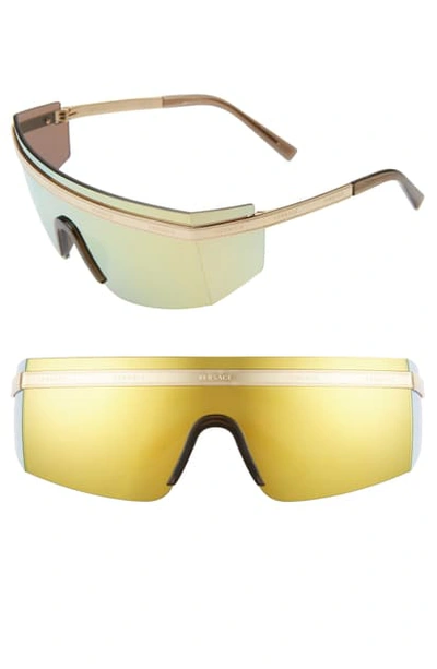 Shop Versace 65mm Shield Wrap Sunglasses In Gold/ Gold Mirror