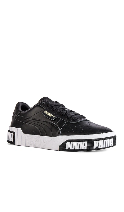 Shop Puma Cali Bold Sneaker In  Black & Metallic Gold