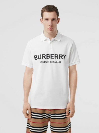 Shop Burberry Logo Print Cotton Piqué Polo Shirt In White