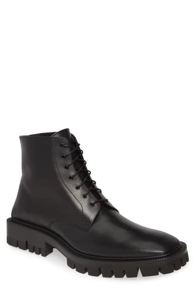 Shop Balenciaga Lugged Combat Boot In Noir