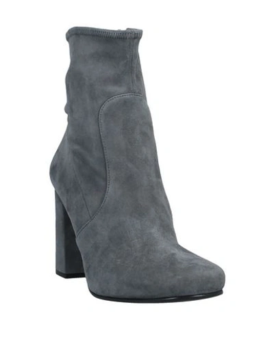 Shop Prada Ankle Boot In Grey