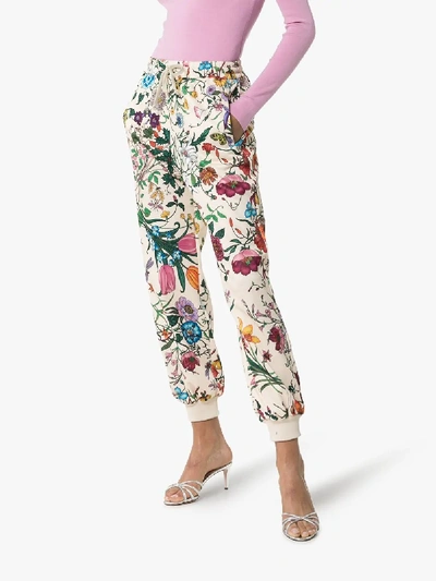 Shop Gucci Womens Neutrals Flora Print Track Pants