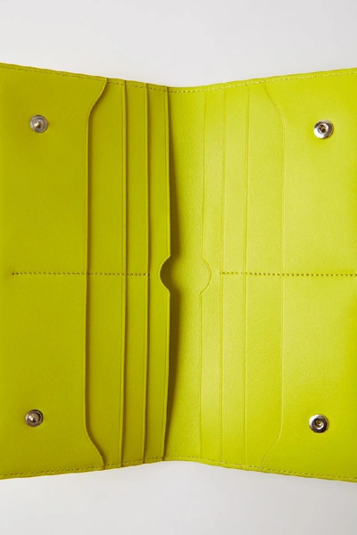 Shop Acne Studios Bifold Continental Wallet Lime Green