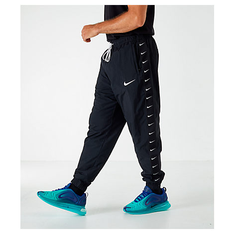 nike swoosh woven pants men's